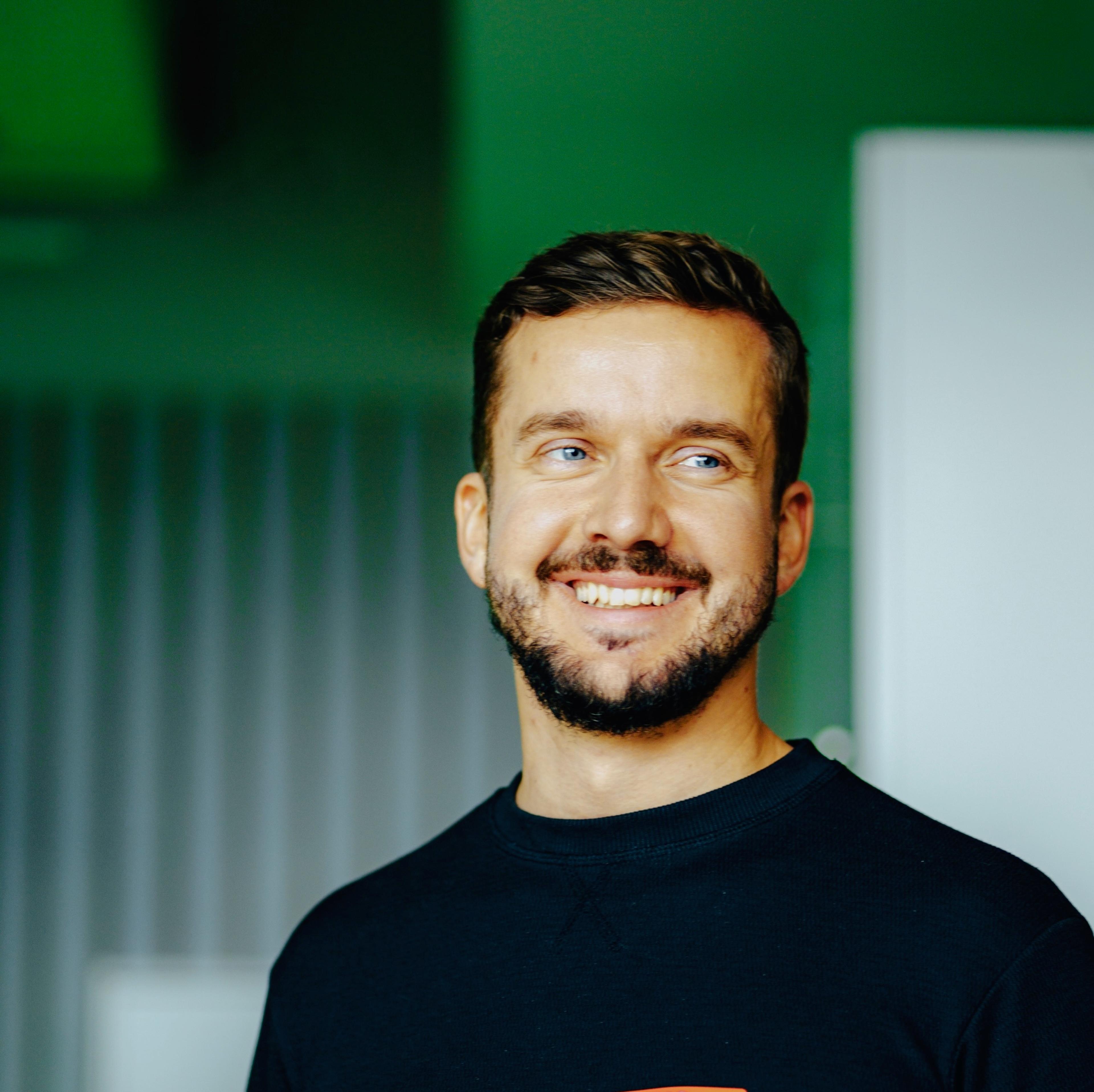 Photo of Aleksander Uznański, Founder